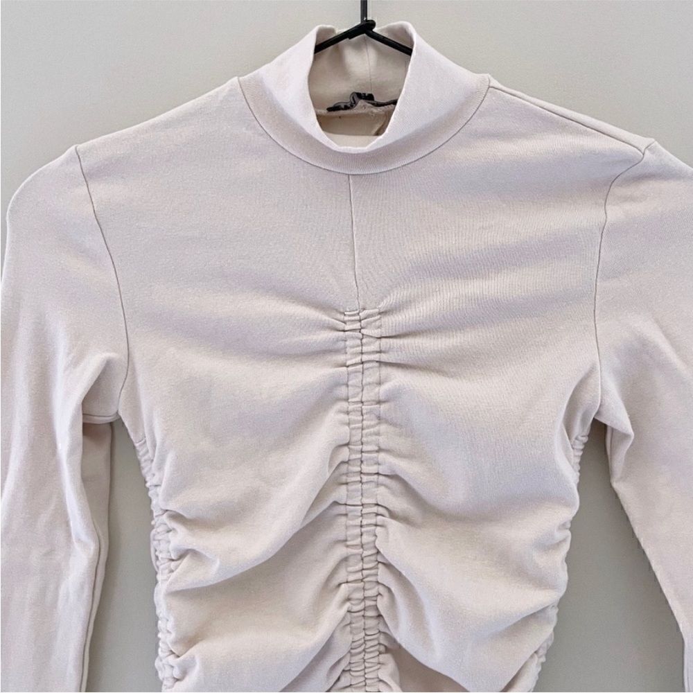 Zara mock neck ruched cream colored top in perfect condition. Size small